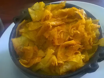 Chechebsa: crisp pieces of flatbread tossed in spiced butter