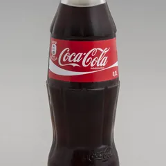 A glass bottle of Coca-Cola
